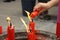 Firing the candle in a temple