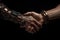 A Firm Handshake Illustrating the Blending of Human and Robotic Capabilities, a Coalescence of Man and Machine