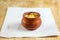 Firni, phirni anf kheer with nuts served in pot isolated on mat top view of indian, bangali and pakistani dessert mithai