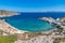 Firopotamos beach with church, houses and cliffs