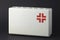 First aid kit with isolated black background, First aid kit used for medical assistance