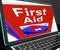 First Aid On Laptop Shows Medical Assistance