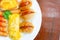 First Breakfast with Sausage, bread,egg on white plate in the morning time,close-up view.