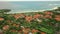 First coastline coast beach hotels area in Bali, aerial view of resort buildings