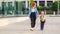 First day at school. mother leads  little child boy in grade