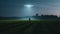 First Encounter Man Meets Alien by Landed UFO in Field at Night