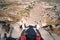 First face look. Uchisar Castle. Tourist at the top of the fortress, mountains, view of Cappadocia. Man lags, male Traveler at