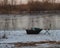 The first frost and the first winter fishing for pike. Stool and fishing gear in a fisherman`s sled. Winter fishing