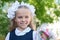 First grader girl with bows