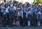 First-graders with high school students on the day of knowledge on September 1 in the schoolyard