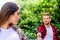 First love. happy valentines day. summer camping in forest. girl in selective focus with guy in park. couple in love