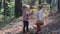 First love. Kids in the forest. Children in the forest. Girl and boy playing in the forest. Autumn, summer. Happy kids