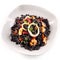First person perspective of Arroz Negro dish
