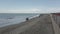 First person shot strolling on sandy beach in a beutiful winter day