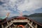 First person view of Wooden moving boat with Seascape and Clear Sky , perspective exploring the ocean, traditional long tail boat,