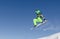 First plane of a snowboarder jumping in a sunny day in Aspen ski resort, United States