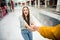 First point view photo of cheerful excited energetic crazy girl hold hand pull her boyfriend wear striped shirt denim