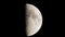 First Quarter Moon moving through the sky with hot air turbulence