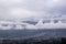 First snows in the mountains seen from the valley