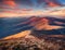 First sunlight glowing mountain hills of Carpathian mountains, Ukraine, Europe.