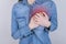 First symptoms of problems with heart concept. Cropped close up photo of sad unhappy upset lady holding hands on chest isolated on