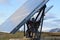 First view of solar panels in Farm of solar panels in the field.