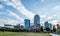 First Ward Park  with modern skyscrapers in the background under a cloudy sky Charlotte, USA