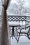 The first white fluffy snow on the table and chairs on the wrought-iron balcony. Fabulous winter