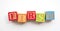 First word made from colourful wooden baby development blocks