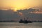 Fish boats at sunset