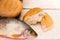 Fish and breads on white background