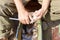 Fish cleaning. Hands of a man cleaning fish from the river, closeup