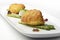 Fish dish Salt cod breaded Milanese style with asparagus