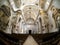 Fish eye view of the rows of pews in the church