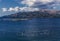 Fish farm and large flock of seagulls sitting on the water , view from Albanian coast to Corfu, Greece. Beautiful Ionian sea