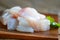 Fish fillet on wooden board with ingredients celery for cooking, fresh raw pangasius fish fillet with, meat dolly fish tilapia