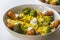 Fish fingers with yellow rice and broccoli - hearty rustic recipe with selective focus