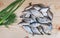 Fish hooked in the river on a table surface.