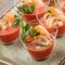 Fish mousse with shrimps and squids in glass cups on banquet table. Delicious appetizers, gourmet food close up, snack