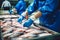 Fish processing plant. People sort the fish moving along the conveyor. Sorting and preparation of fish