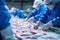 Fish processing plant. Production Line. People sort the fish moving along the conveyor. Sorting and preparation of fish.