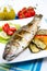 Fish, sea bass grilled with lemon