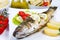 Fish, sea bass grilled with lemon ,salad and potatoes
