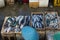 A fish sellers in the jimbaran bali fish market. He sells various types of fresh fish that have just been caught