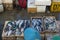 A fish sellers in the jimbaran bali fish market. He sells various types of fresh fish that have just been caught