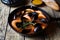 Fish soup bouillabaisse. Mussels and shrimp in tomato sauce. The traditional dish of Marseilles. Rustic style.