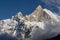 Fish Tail Summit also Machapuchare surrounded by rising clouds, Himalayas