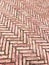 Fishbone-patterned red bricks pavement