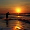 Fisher man fishing with spinning rod on sea bank at sunrise. Generative AI