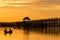 Fisher man at Ubein Bridge at sunset, Mandalay, Myanmar.